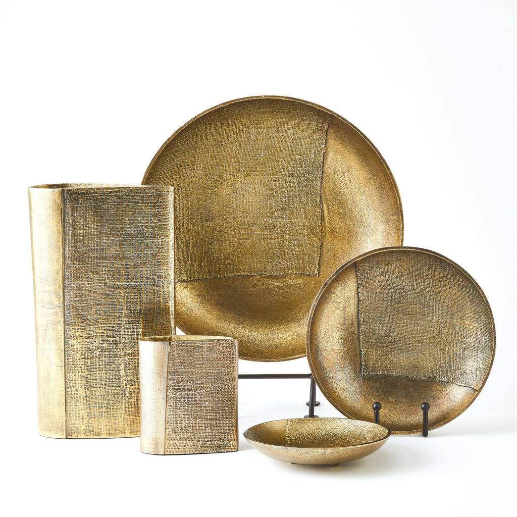 Gold-colored, handcrafted platters and vases. Luxury plates, bowls, and vases available at Ruth Livingston Studio in Tiburon and the San Francisco Bay Area. 