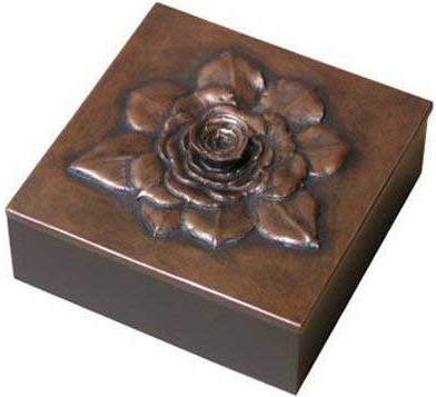 A hand carved wood box, representing several handmade boxes, perfect for decorating a home or gift giving.